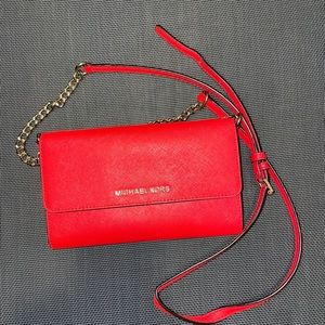 red crossbody mk bag